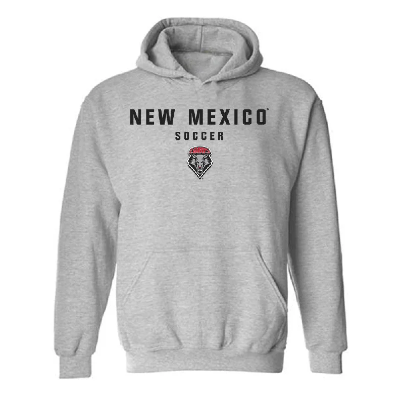 New Mexico - NCAA Women's Soccer : Presley Devey - Classic Shersey Hooded Sweatshirt Hoodie with Camouflage Military Edgy